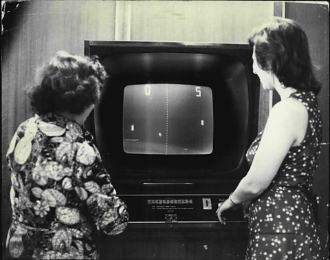 two women playing the first games console