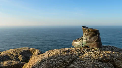 Olivier Guiberteau A bronze boot at Cape Finisterre, Spain, marks the end of an ancient pilgrimage route (Credit: Olivier Guiberteau)