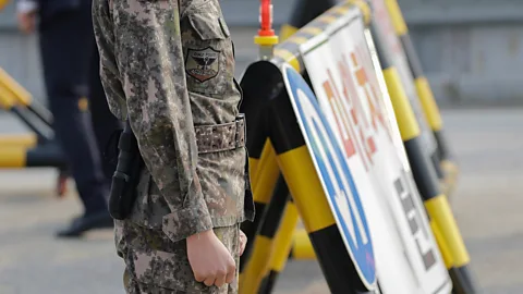 Getty Border guards are not known for their sympathetic attitude, but increasing reliance upon artificial intelligence could make reasoning with them even harder (Credit: Getty)