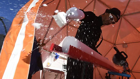 Getty The cores are removed one metre at a time before being prepared for transport down the mountain to a laboratory (Credit: Getty)