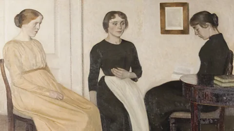 Ribe Kunstmuseum Ida is pictured with her two sisters-in-law in the uneasy family portrait Three Young Women (1895) (Credit: Ribe Kunstmuseum)