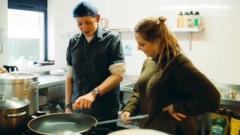 John-Jo working in the kitchen.