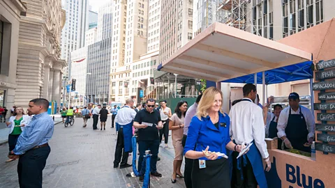 Alamy Visitors queue up for samples from meal kit maker Blue Apron outside the New York Stock Exchange in June 2017 (Credit: Alamy)