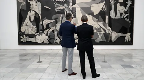 Handout/Getty Images King Felipe VI of Spain and former US President Barack Obama visit the Reina Sofia Museum (Credit: Handout/Getty Images)
