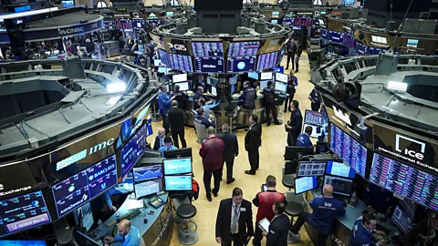 Getty Images There are curious parallels between Wall Street traders and the paparazzi. Both try to manage financial risk every day (Credit: Getty Images)