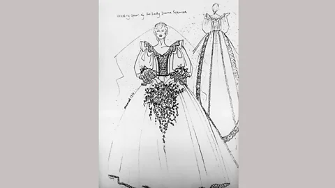 Getty Images The Emanuels’ sketch of Princess Diana’s wedding dress, which was hand-embroidered with pearls and had a wide frill around the neckline (Credit: Getty Images)