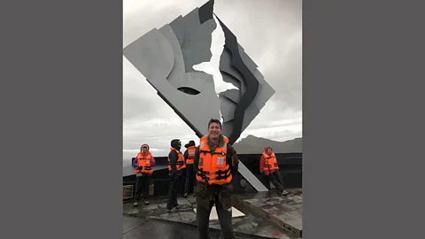 Ben Sayer Author James Clark standing at the foot of the memorial to the many sailors who have lost their lives attempting to 'round the Cape' (Credit: Ben Sayer)