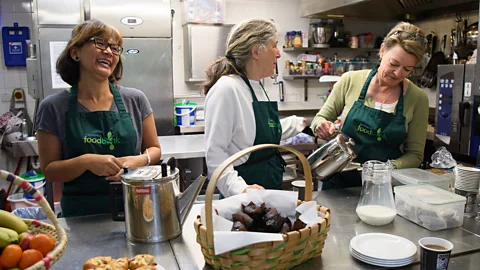 Getty Images Volunteers prepare food for the needy at a London charity (Credit: Getty Images)