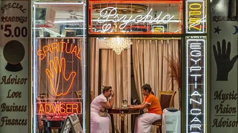 Getty Images A psychic fortune teller giving a reading in Atlantic City in New Jersey (Credit: Getty Images)