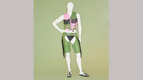 Metropolitan Museum of Art/ Johnny Dufort A lurid pink-and-green waistcoat, chaps and underpants by Jeremy Scott are among the Met exhibits (Credit: Metropolitan Museum of Art/ Johnny Dufort)