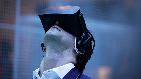 Getty Images An attendee at the Virtual Reality conference in LA (Credit: Getty Images)