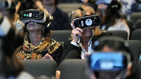 Getty Images Attendees wear VR headsets at An Evening with Lynette Wallworth in 2016 (Credit: Getty Images)