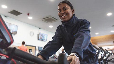 Lia on an exercise machine at the leisure centre