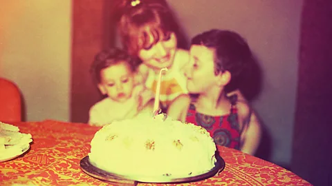 Getty Images A little girl enjoying her first birthday cake (Credit: Getty Images)