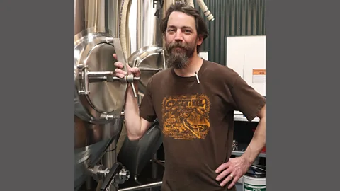 Ross Kenneth Urken Skagway Brewing Co. brewmaster Trevor Clifford uses spruce tips collected by locals to make the brewery’s signature Spruce Tip Blonde Ale (Credit: Ross Kenneth Urken)