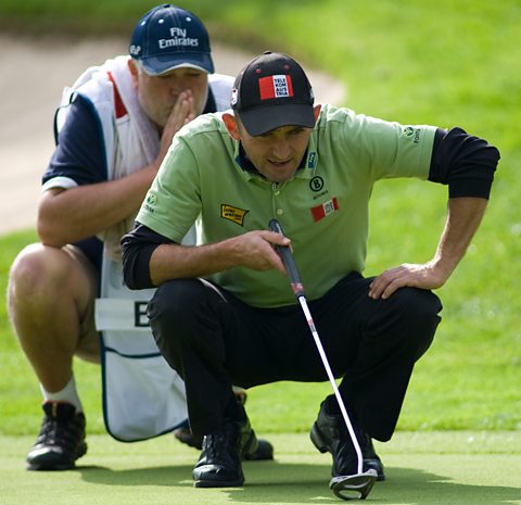 Photo of professional golfer Markus Brier Aut assessing the putt