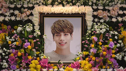 Getty Images Tributes to Kim Jong-Hyun, the 27-year-old lead singer of SHINee (Credit: Getty Images)