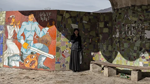 Woman in Soviet bus stop