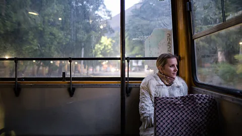 Female passenger on bus