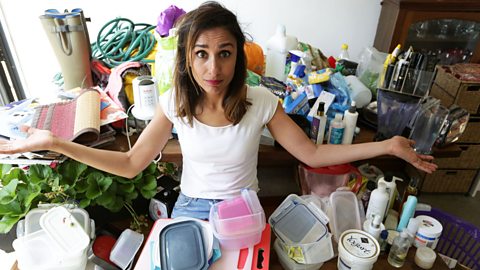 Anita Rani at home surrounded by plastic items