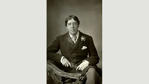 Alamy Followers of the gay Irish playwright Oscar Wilde (pictured) wore carnations in their lapels (Credit: Alamy)