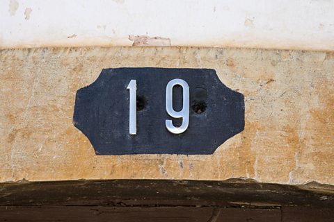 Photograph of a door sign