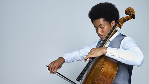 Sheku Kanneh Mason blue background