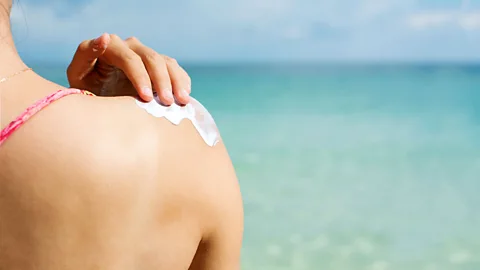 Getty Images Sunscreen emboldens us to spend longer in the Sun than we would otherwise, which may be one reason why skin cancer rates are rising (Credit: Getty Images)