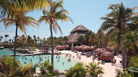 Getty Images The ecological resort Xcaret has instituted a policy whereby visitors must swap their sunscreen for one which is more biodegradable (Credit: Getty Images)