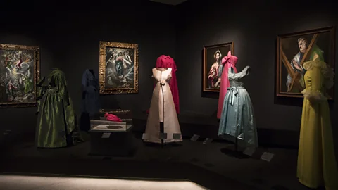 Museo Nacional Thyssen-Bornemisza, Madrid/ Jon Cazenave The El Greco room at the exhibition shows how the painter’s sumptuous palette influenced the designer (Credit: Museo Nacional Thyssen-Bornemisza, Madrid/ Jon Cazenave)