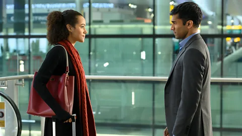 Hulu Instead of Hugh Grant, the new Four Weddings and a Funeral TV spin-off has Nikesh Patel’s Kash (right, with Nathalie Emmanuel) as the dashing romantic lead (Credit: Hulu)