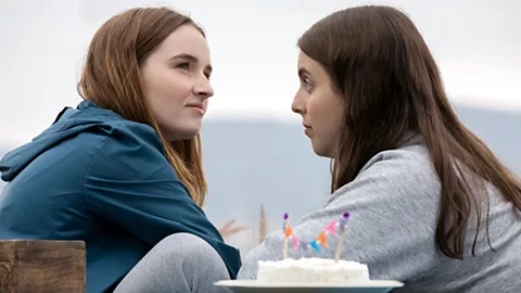 Annapurna Pictures Booksmart doesn’t present a rose-tinted view of friendship, with a scene in which the central characters have a blazing row in front of partygoers (Credit: Annapurna Pictures)