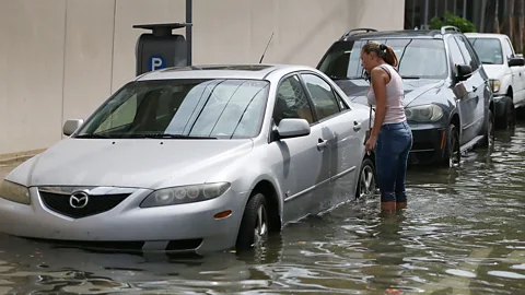 Getty Images Humans working jobs is bad for the environment, from our pollutant-spewing commutes to the high-carbon goods we buy with our earnings (Credit: Getty Images)