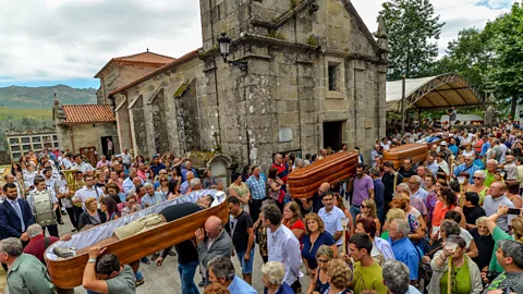 Olivier Guiberteau View of the coffin procession at the Santa Marta de Ribarteme festival in Galicia, Spain