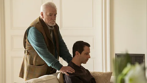 HBO Succession explores the tragic cycle of abuse that passes from patriarch Logan (left) to son Kendall (right) and other siblings