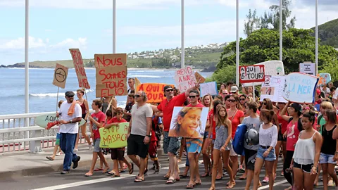 Getty Images A spate of shark attacks on Reunion Island led to calls for the local authorities to take action beyond bans on swimming and surfing (Credit: Getty Images)