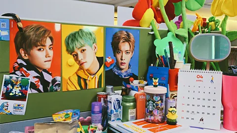 Hyeyoung Rha Sales manager Hyeyoung Rha, 30, has a Hollywood theme to her deskterior, particularly adding new action figures when she buys them (Credit: Hyeyoung Rha)