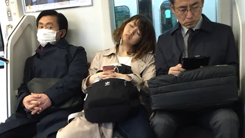 Why overtired Japan is turning to office siestas