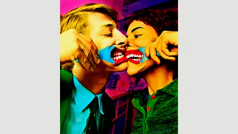 Courtesy of the artist El beso – Ouka Leele took photos in black-and-white, and then hand-tinted them with watercolours (Credit: Courtesy of the artist)