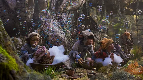 Netflix The show reaches its peak of adorability with a scene of Podling villagers being forcibly washed en masse (Credit: Netflix)