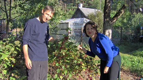 Susanna Zaraysky After crunching through the woods, the author (right) found the son of the dacha owner and her beloved berries (Credit: Susanna Zaraysky)