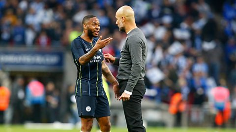 Raheem Sterling and manager Pep Guardiola