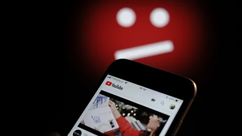 Getty Images When YouTube recommends a video, it uses AI that has to be trained – a job done by people like Mark Catt (Credit: Getty Images)