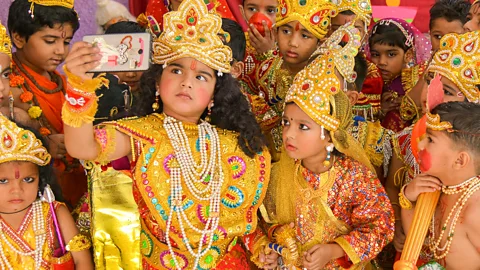 Getty Indian children dressed as Hindu deities Rama and Sita celebrate Diwali (Credit: Getty)