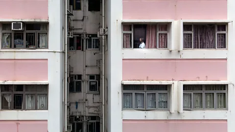 Megumi Lim Lam Lok, 31, lives with her parents in Hong Kong Island's North Point, more than an hour away from her husband, 35-year-old Jason Chau (Credit: Megumi Lim)