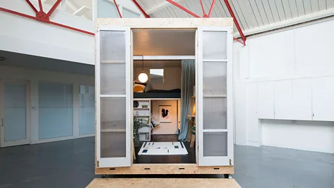 Studio Bark Richards's 11.15-sq m box on wheels was built as a parasitic home within an existing warehouse space. It fits a double bed, a desk and a chair (Credit: Studio Bark)