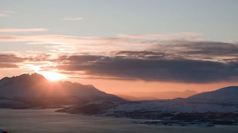 Cultura RM/Alamy Every summer, crowds gather at the summit of Mount Storsteinen in Tromsø, Norway, to watch the Sun set for the first time in two months (Credit: Cultura RM/Alamy)