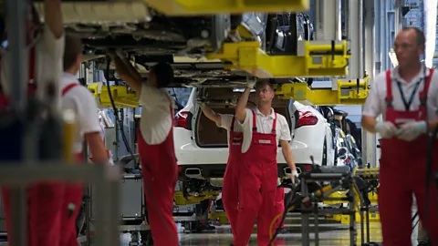 Alamy At Porsche’s plant in Leipzig, the company uses ergonomics to help workers get through shifts without strain, which may enable older workers to be more productive (Credit: Alamy)