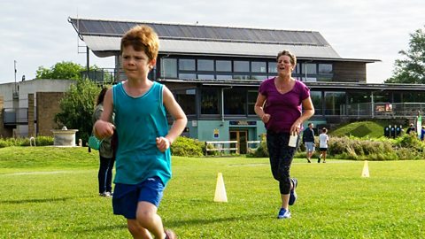 Rowan, a boy with autism, doing Park Run with his mum as a good physical activity to complement home learning.