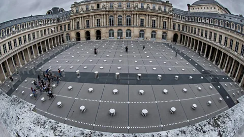 Getty Daniel Buren’s Les Deux Plateaux was initially viewed with disdain but 30 years later is widely revered (Credit: Getty)